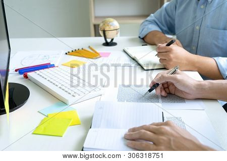 Woman And Man Work For Education Or Business On The Table
