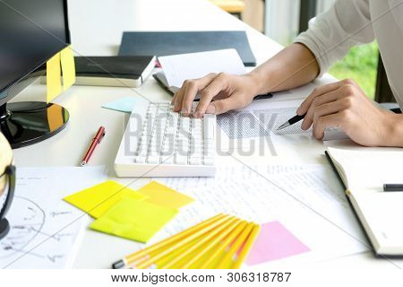 Woman And Man Work For Education Or Business On The Table