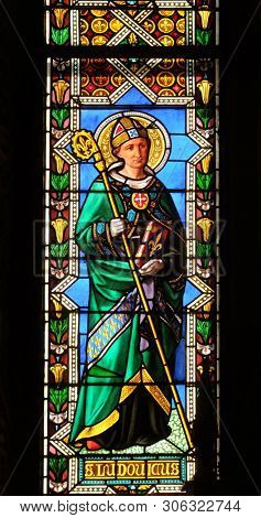 FLORENCE, ITALY - JANUARY 10, 2019: Saint Ludovicus, stained glass window in the Basilica di Santa Croce (Basilica of the Holy Cross) - famous Franciscan church in Florence, Italy