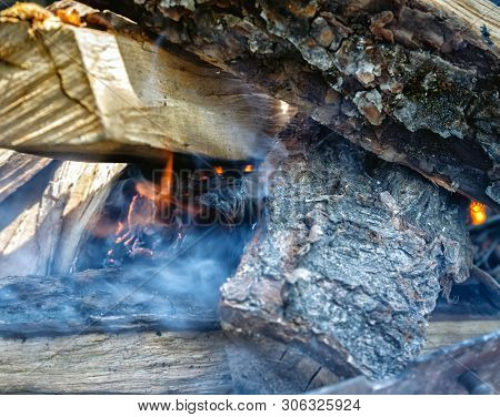 Only He Took Appeared The Fire Among The Wood-fire In The Grill