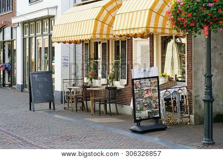 Facade Of A Cafe De Bakkerswinkel On The Street Of The Old City Dorpstraat. 30 August 2018. Zoeterme