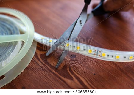 Trimming The Led Strip For Installation In Niches At Home Close-up
