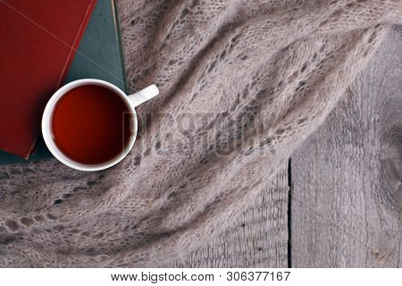 Hot Tea And Book With Woolan Plaid On Wood Background - Seasonal Relax Concept. Autumn Winter Weeken