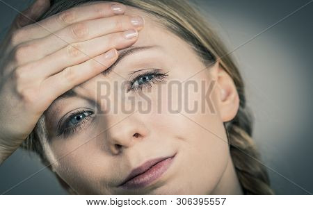 Young Blonde Woman Having Serious Migrene Suffering From Horrible Head Ache Feeling Big Pain.