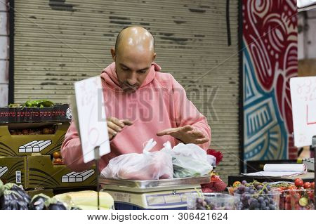 Tel Aviv , Israel - 21 November 2017: Sellers On The Old Grocery Street Nahalat-benjamin