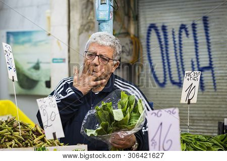 Tel Aviv , Israel - 21 November 2017: Sellers On The Old Grocery Street Nahalat-benjamin
