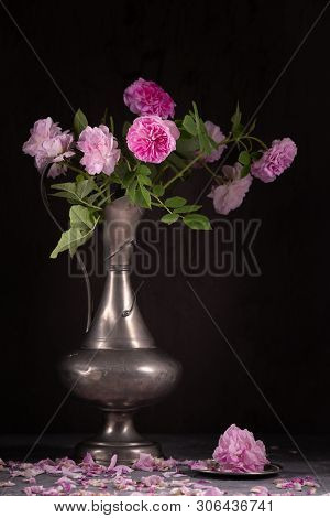 Vintage Still Life With Pink Roses And Tin Jug