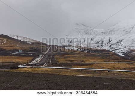 Pipeline In The Hills Snow-covered, Mutnowskaya Power Station, Eastern Mountains. Jelizevo District,