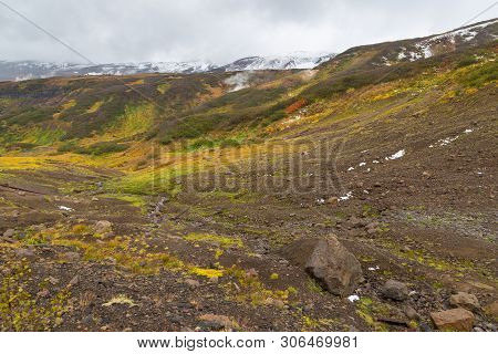 View Of The Eastern Mountain Covered By Clouds, Jelizevo District, Peninsula Kamchatka. Landscape In