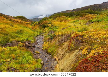 View Of The Eastern Mountain Covered By Clouds, Jelizevo District, Peninsula Kamchatka. Stream Flowi