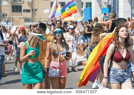 The Annual Parade Lgbt. Girls Lesbians Walking In The Gay Pride Parade. Parade Of Tolerance. Rainbow