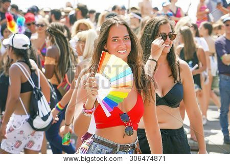 The Annual Parade Lgbt. Girls Lesbians Walking In The Gay Pride Parade. Parade Of Tolerance. Rainbow