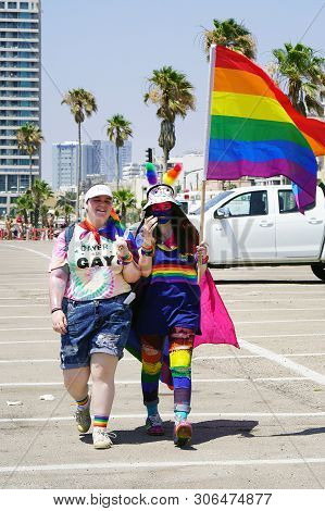 The Annual Parade Lgbt. Girls Lesbians Walking In The Gay Pride Parade. Parade Of Tolerance. Rainbow