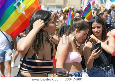 The Annual Parade Lgbt. Girls Lesbians Walking In The Gay Pride Parade. Parade Of Tolerance. Rainbow
