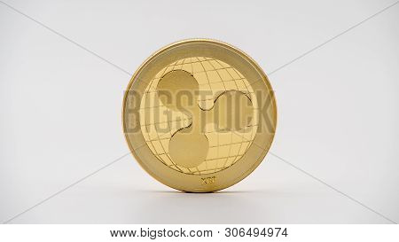 Physical Metal Golden Ripplecoin Currency On White Background. Xrp Coin