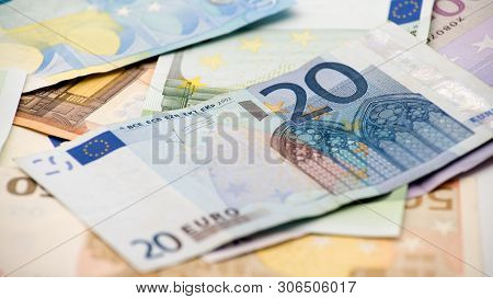 Euros Bills Of Different Values. Euro Bill Of Twenty Over Others Bills