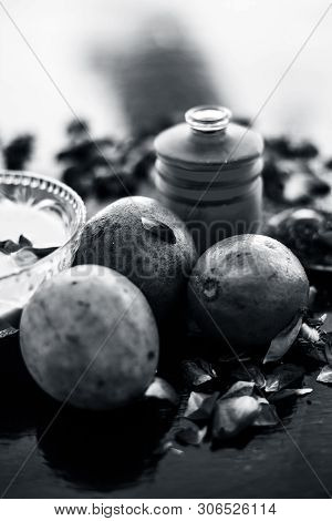 Face Pack For Cheeks On Wooden Surface Consisting Of Sapodilla Or Chikoo Well Mixed With Sandalwood