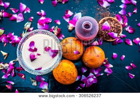 Face Pack For Cheeks On Wooden Surface Consisting Of Sapodilla Or Chikoo Well Mixed With Sandalwood