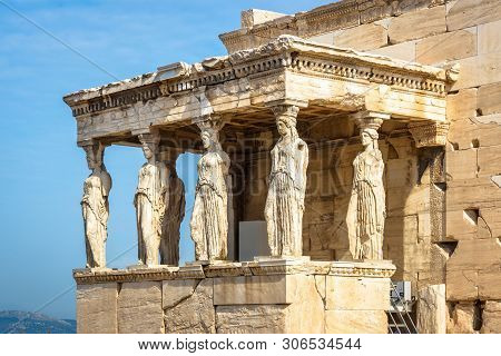 Caryatid Porch Of The Old Erechtheion Temple, Athens, Greece. It Is A Famous Landmark Of Athens. Bea
