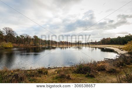 Largely Dried Up Lake After A Prolonged Drought In The Summer Period. It Is An Old Clay Quarry In Th