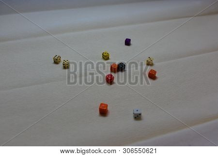 Colorful D6 Dice On A White Background With Faded Back