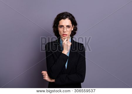 Portrait Of Charming Confident Gorgeous Entrepreneur Touch Chin Look Serious Focused Wavy Culry Hair
