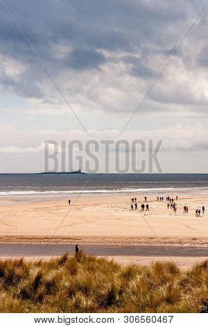 Alnmouth Beach With People Walking, Northumberland, England. 11 May 2019. Alnmouth Beach With Day Vi