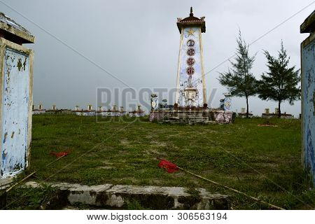 Lang Co, Vietnam - September, 2015: Cemetery Of The Vietnam War With Old Weathered  Tombstones And S