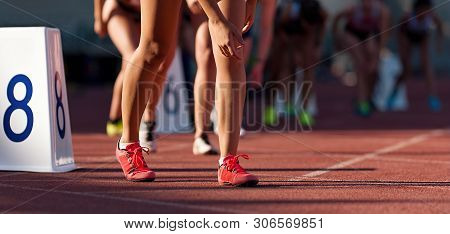 Sports Women Starting Run Sprint Race On Track And Field Competitions