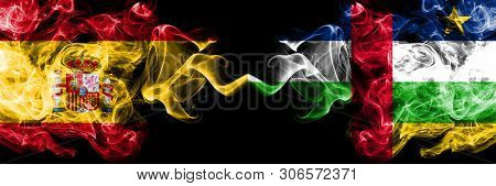 Spain Vs Central African Republic Smoky Mystic Flags Placed Side By Side. Thick Colored Silky Smokes