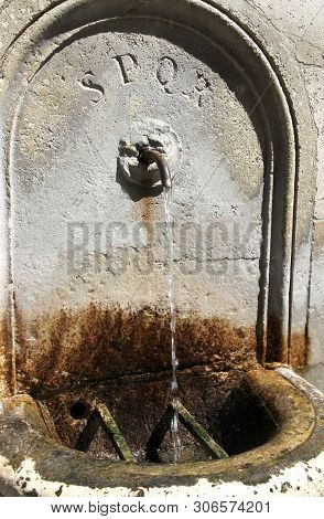 Ancient Roman Fountain With Text Spqr That Means Roman Senate And Roman People In Latin Language In 