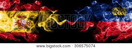 Spain Vs Liechtenstein, Liechtensteins Smoky Mystic Flags Placed Side By Side. Thick Colored Silky S