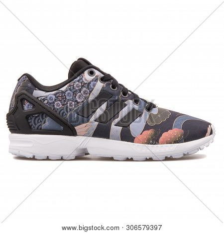 Vienna, Austria - August 10, 2017: Adidas Zx Flux Floral Print Black Sneaker On White Background.