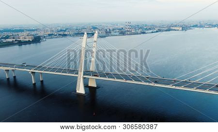 Motion Along Modern Cable-stayed Bridge Against Cityscape