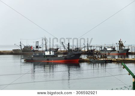 Wonsan, North Korea - May 4, 2019:  View On The Small Fishing Ships In Marina Nearby Wonsan, One Of 
