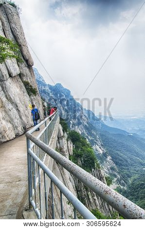 August 16, 2015.  Mount Song, China.  The Sanhuang Plank Way Secured To The Cliff Side On Mount Song