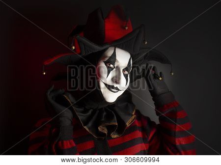 Beautiful Playful Smiling Jester Woman, Close-up. Halloween Concept