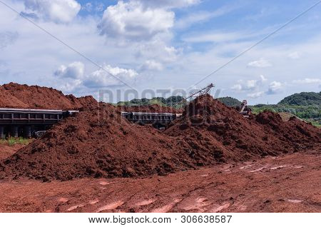 Excavator Loading Clay To The Train