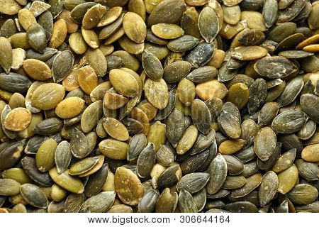 Raw Shelled Pumpkin Seeds Or Pepitas As Background