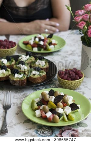 A Gourmet Lunch For Two: A Plate Of Guacamole Sandwiches With Blackberries, Cream Cheese And Aragula