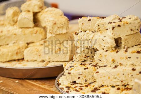 Halvah Sweet Traditional Food Dessert Made Of Nuts. Delicious Food, Tasty Healthy Snacks Concept.