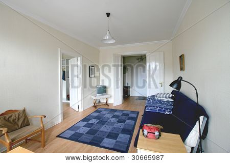 Beautiful wide bed in a classic bedroom