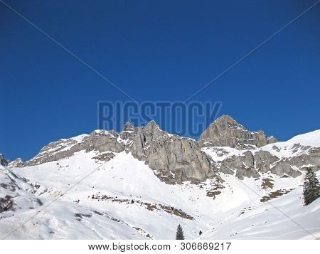 Panorama Of The Rossstock, Fulen And Chaiserstock In The Swiss Alps In Winter