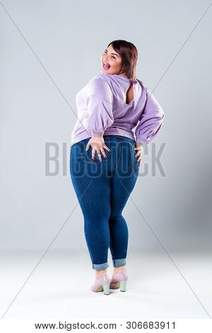 Happy Plus Size Model In Casual Clothes, Fat Woman On Gray Background, Body Positive Concept
