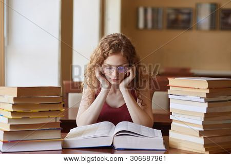 Image Of Woman Teenager Sitting In Reding Room, Lady Reading Book, Preparing For Final Examination, 