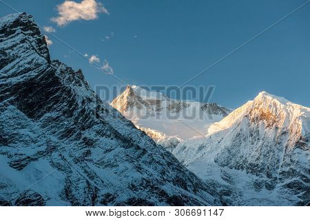 View Of Snow Covered Peak Of Mount Manaslu During Sunrise (8 156 Meters) With Clouds In Himalayas, S