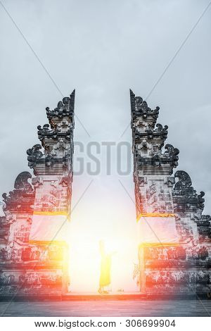 Silhouette Of Woman Standing At Sunlight. Lempuyang Temple, Bali Indonesia