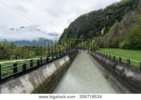 Water Channel In Alp Mountains Near Belluno