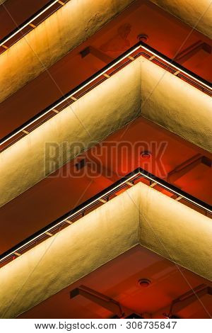 A Close Up Look At The Jinhea Tower At Night Focusing On The Repetition Of The Multiple Floors Formi