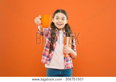 Help Yourself. Cute Schoolgirl Enjoying School Break On Orange Background. Little Girl Having Tea Br